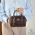 کیف دخترانه صندوقی آمیتیس طرح کوچ COACH دارای آویز گیلاس