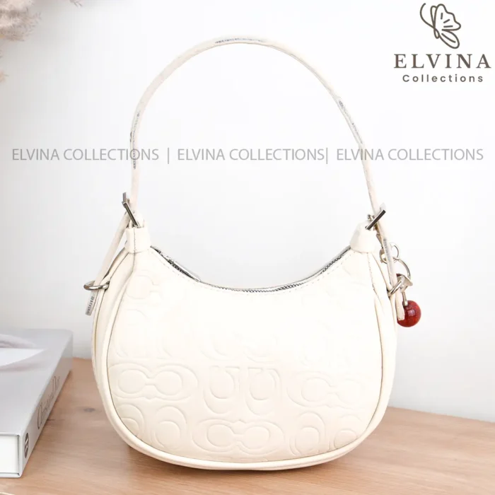 کیف قایقی دخترانه تیارا طرح کوچ COACH دارای آویز آلبالو - Image 4